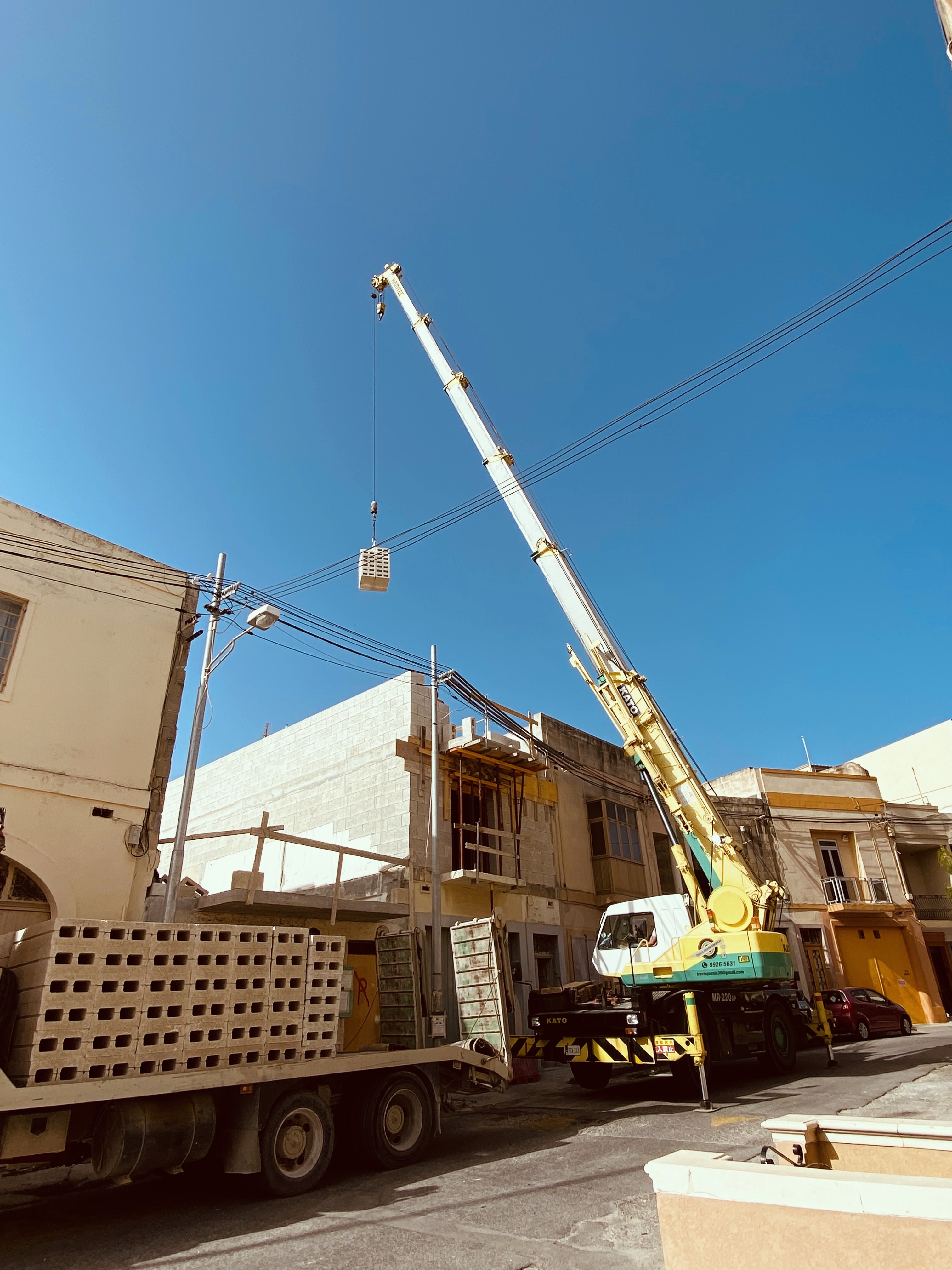 Crane construction machinery in street